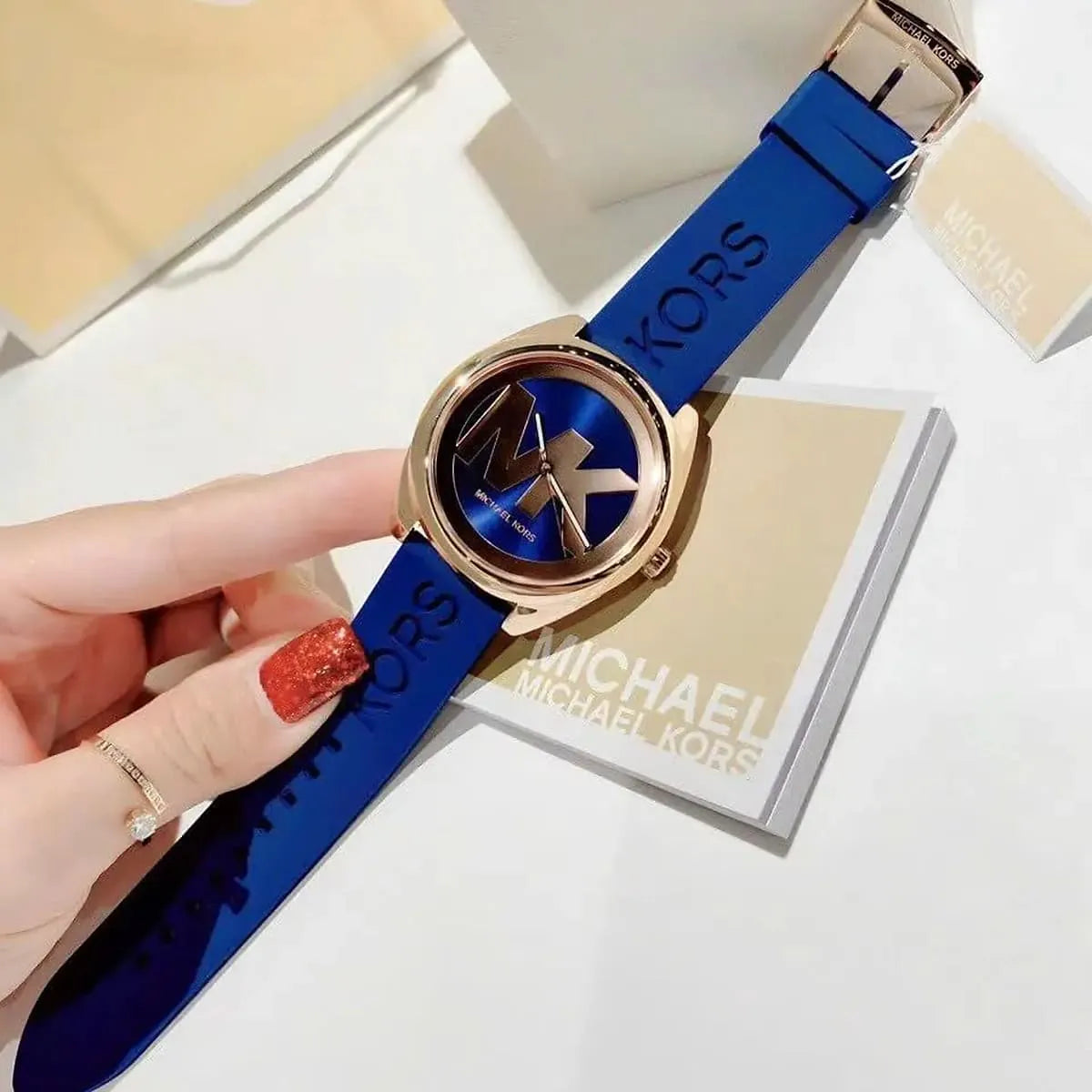 Michael Kors Janelle MK7140 42mm Women's Quartz Watch – Rose Gold with Rose Gold Silicone Strap